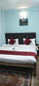 Postel nebo postele na pokoji v ubytování Hotel Pearl Retreat