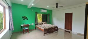 Postel nebo postele na pokoji v ubytování Happy Moon Homestay