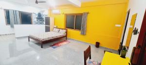 Postel nebo postele na pokoji v ubytování Happy Moon Homestay