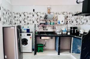 Kuchyň nebo kuchyňský kout v ubytování Happy Moon Homestay