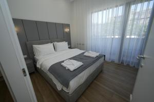 Ένα ή περισσότερα κρεβάτια σε δωμάτιο στο Ser In Hotel +59 φωτογραφίες