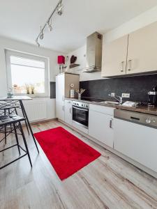 Kuchyň nebo kuchyňský kout v ubytování Schiller-Quartier 6