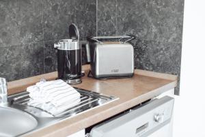 Kuchyň nebo kuchyňský kout v ubytování Schiller-Quartier 6