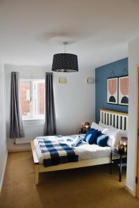 Ένα ή περισσότερα κρεβάτια σε δωμάτιο στο Luxurious & Spacious 2 bed Apartment in Milton Keynes