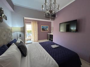 Postel nebo postele na pokoji v ubytování Palataki Residence