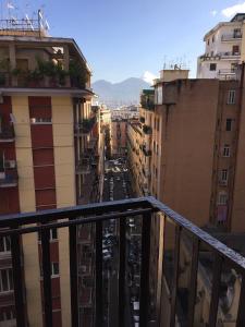 a view of a city from a balcony at Factory Design in Naples