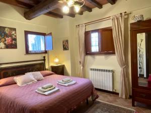Postel nebo postele na pokoji v ubytování Casa Leonardo