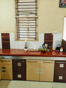 Kuchyň nebo kuchyňský kout v ubytování Ava Homestay