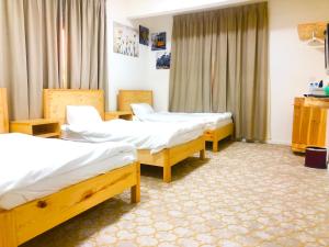 Postel nebo postele na pokoji v ubytování 411Motel