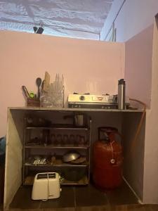 Tiny Home Jodhpur - A studio apartment的厨房或小厨房