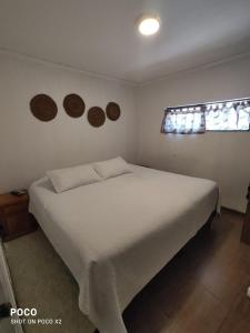 Un ou plusieurs lits dans un hébergement de l'établissement HOSTAL LA MODERNA
