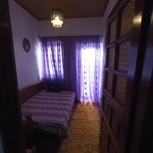 Postel nebo postele na pokoji v ubytování Anilio House