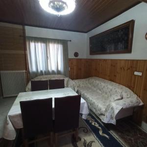 Postel nebo postele na pokoji v ubytování Anilio House