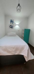 Un ou plusieurs lits dans un hébergement de l'établissement HOSTAL LA MODERNA