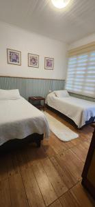 Un ou plusieurs lits dans un hébergement de l'établissement HOSTAL LA MODERNA