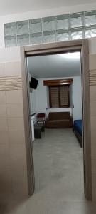 A bed or beds in a room at All inBasilicata Bed & Breakfast