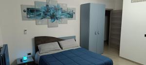 A bed or beds in a room at All inBasilicata Bed & Breakfast