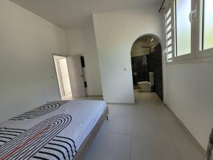 Ένα ή περισσότερα κρεβάτια σε δωμάτιο στο Magnifique Villa avec Piscine et mer
