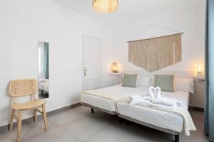 Postel nebo postele na pokoji v ubytování Bayside Cocoteros Hideaway Serenity Cove