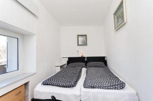 Ένα ή περισσότερα κρεβάτια σε δωμάτιο στο House Ana