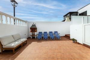 Balkón nebo terasa v ubytování Bayside Cocoteros Hideaway Serenity Cove
