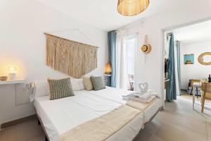 Postel nebo postele na pokoji v ubytování Bayside Cocoteros Hideaway Ocean Nest