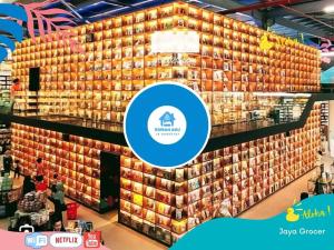 a large wall of boxes in a store at Spacious Theme Villa w BBQ-Game On-KTV in Johor Bahru in Iskandar Puteri