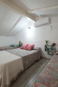 A bed or beds in a room at Rincón de Marco y María