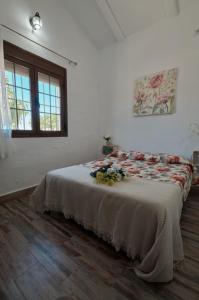 A bed or beds in a room at Rincón de Marco y María