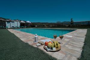 The swimming pool at or close to Rincón de Marco y María