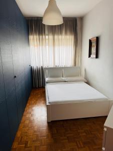 Postel nebo postele na pokoji v ubytování Lovely apartment in Gallarate