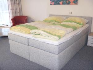 Letto o letti in una camera di Haus Delphin