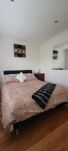 A bed or beds in a room at Beach front unit in Capel Sound