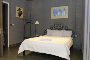 Postel nebo postele na pokoji v ubytování Lavender Hotel 202 - Nam Đuống, Thượng Thanh, Long Biên