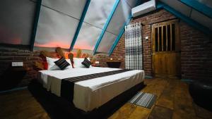 Postel nebo postele na pokoji v ubytování Ali Adi Eco Resort + 37 fotografií