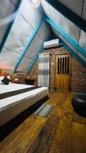 Postel nebo postele na pokoji v ubytování Ali Adi Eco Resort