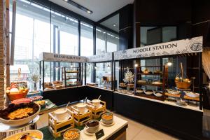 a bakery with a lot of food on display at The Marina Phuket Hotel in Patong Beach