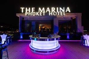 a bar at the marina phuket hotel at night at The Marina Phuket Hotel in Patong Beach
