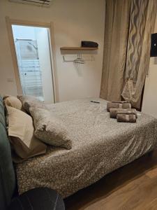 Postel nebo postele na pokoji v ubytování Mxp Room Busto
