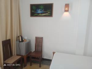Postel nebo postele na pokoji v ubytování Shanthi Place