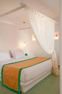 Tempat tidur dalam kamar di Absolute Bliss
