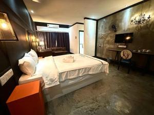 Postel nebo postele na pokoji v ubytování CJ HOUSE station 18 Ipoh