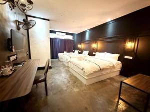 Postel nebo postele na pokoji v ubytování CJ HOUSE station 18 Ipoh