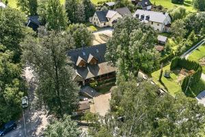an aerial view of a house with trees at Pension Restaurant Bobrovník in Lipova Lazne