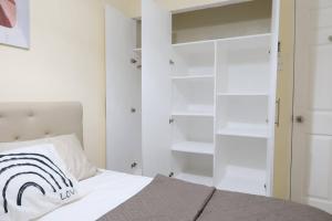 Postel nebo postele na pokoji v ubytování Skyline Home Antipolo