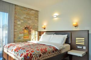 เตียงในห้องที่ Ayasoluk Hotel & Restaurant