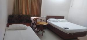 Postel nebo postele na pokoji v ubytování Hotel GARISHPARK