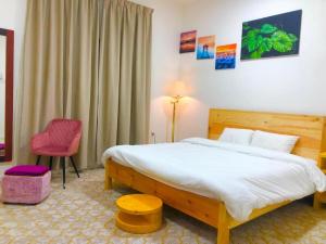 Postel nebo postele na pokoji v ubytování 411Motel