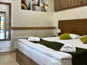 DiliVita Rest House客房内的一张或多张床位