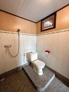 Koupelna v ubytování Kajeng Bungalow